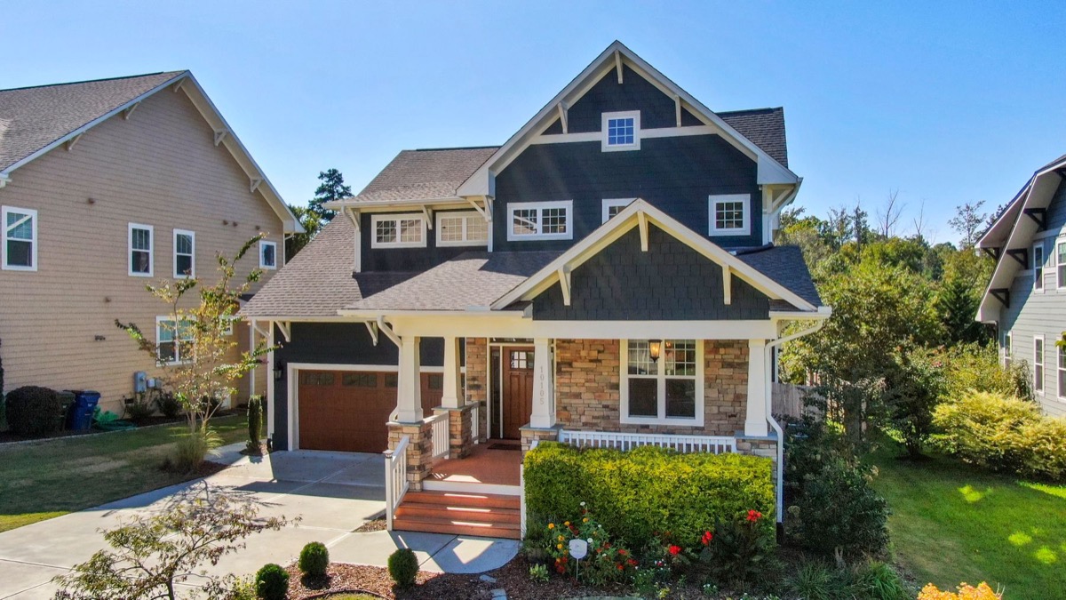 Craftsman-style home exterior with stone porch columns